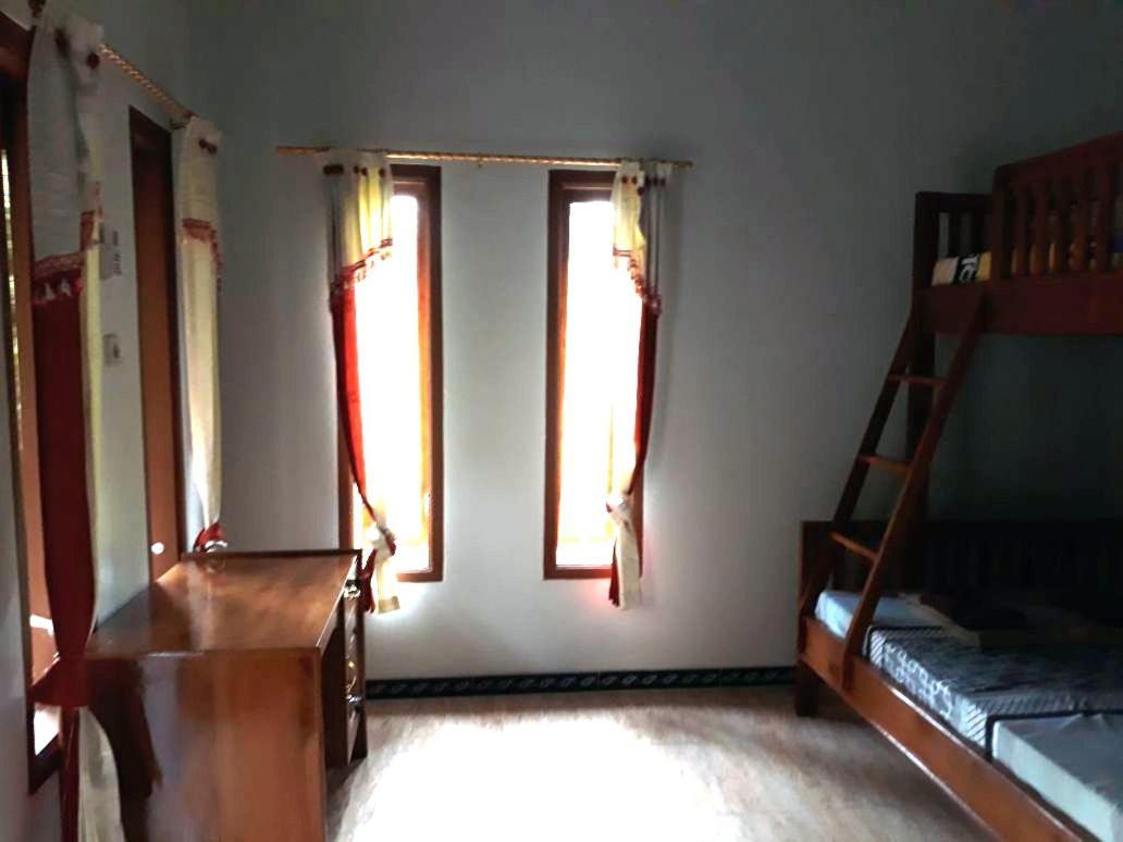 Red Island Bungalows Pasanggaran Pokoj fotografie