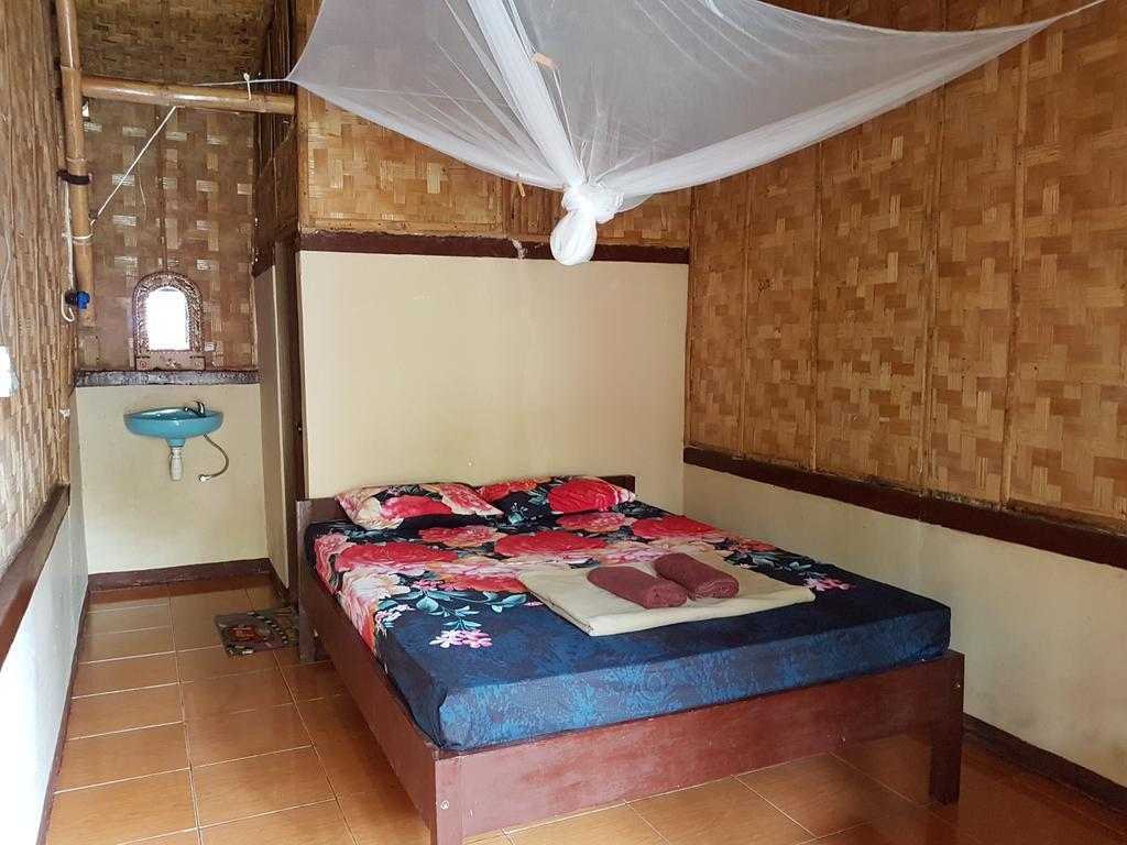 Red Island Bungalows Pasanggaran Pokoj fotografie