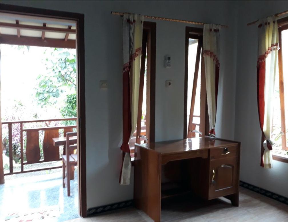 Red Island Bungalows Pasanggaran Pokoj fotografie